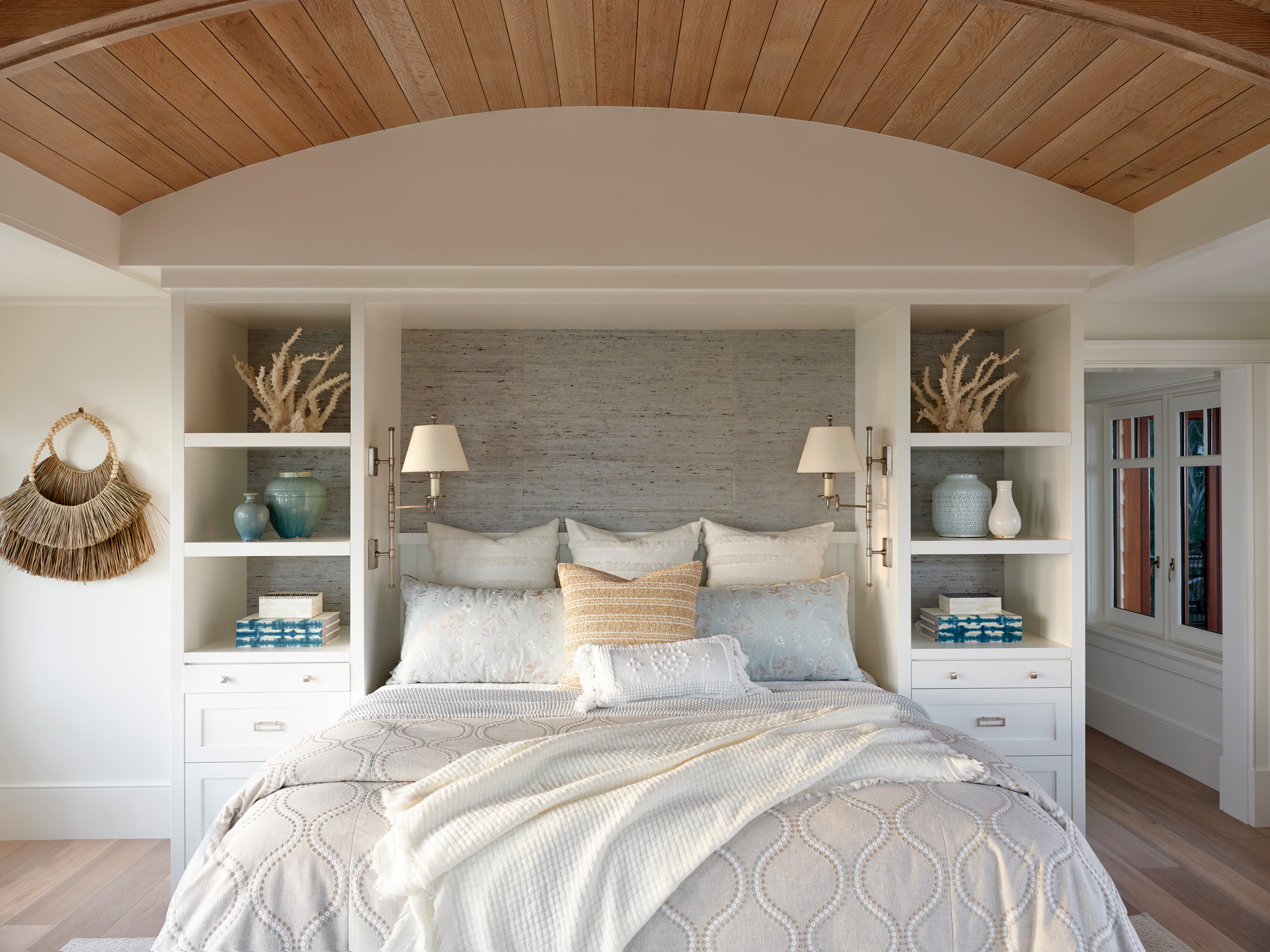 Renee Gaddis designed beach master bedroom photographed by Mali Azima.